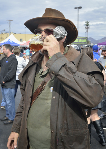 Steve Burcham samples a beer during the Great Vegas Festival of Beer in the 800 block of Fremont Street in Las Vegas on Saturday, April 9, 2016. Bill Hughes/Las Vegas Review-Journal