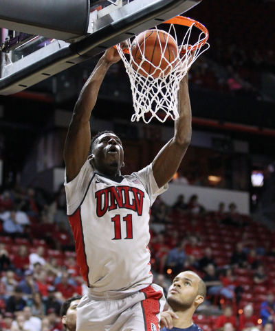 UNLV forward Goodluck Okonoboh dunks on UNR during the first half of their Mountain West Conference tournament game Wednesday, March 11, 2015, at the Thomas & Mack Center. (Sam Morris/Las Vega ...