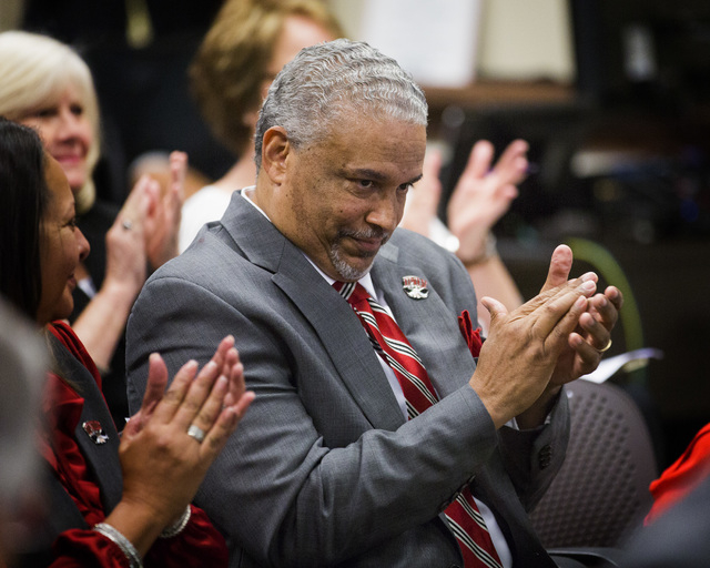 New UNLV men's basketball coach Marvin Menzies applauds after the University of Nevada Board of Regents approved his contract on Friday, April 22, 2016. Jeff Scheid/Las Vegas Review-Journal Follow ...