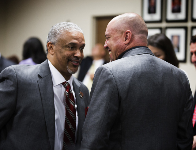 New UNLV men's basketball coach Marvin Menzies and UNLV football coach talk before the University of Nevada Board of Regents approved his contract on Friday, April 22, 2016. Jeff Scheid/Las Vegas ...