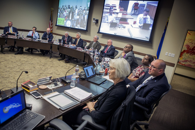 University of Nevada Board of Regents review the contract for new UNLV basketball coach Chris Beard on Friday, April 8, 2016. Jeff Scheid/Las Vegas Review-Journal Follow @jlscheid