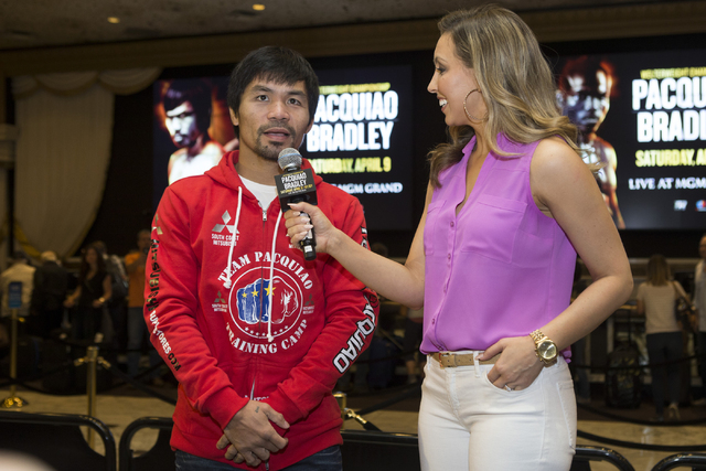 Manny Pacquiao speaks on stage at the MGM Grand Garden Arena in advance of his boxing fight this weekend on Tuesday, April 5, 2016, in Las Vegas. Pacquiao will fight Timothy Bradley for a third ti ...