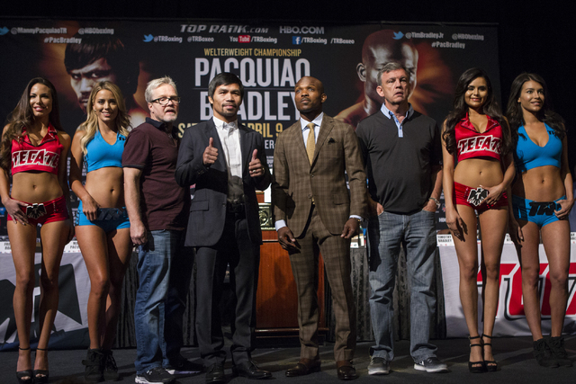 From left, Freddie Roach, Manny Pacquiao, Timothy Bradley Jr. and Teddy Atlas pose during the final news conference before the fight between Pacquiao and Bradley at the MGM Grand casino-hotel on W ...