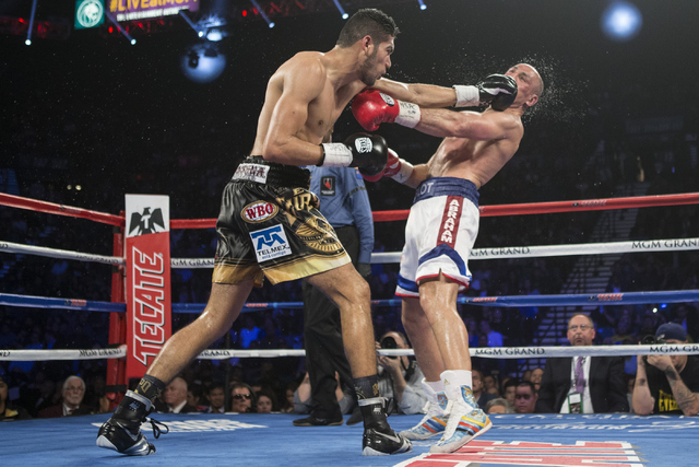 Gilberto Ramirez, left, connects a left punch against Arthur Abraham in the WBO International welterweight championship boxing bout at the MGM Grand Garden Arena on Saturday, April 9, 2016, in Las ...
