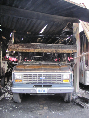 The cab of an RV remains, scorched from the heat of the fire that burned the top and back of the vehicle to ash at the Storage at Summerlin business on West Lake Mead Boulevard on Saturday, April  ...