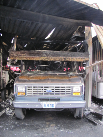 The cab of an RV remains, scorched from the heat of the fire that burned the top and back of the vehicle to ash at the Storage at Summerlin business on West Lake Mead Boulevard on Saturday, April ...