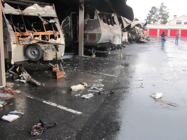 Destroyed travel trailers are shown following a fire at the Storage at Summerlin business on West Lake Mead Boulevard on Saturday, April 9, 2016. The fire damaged or destroyed 37 boats, RVs, trave ...