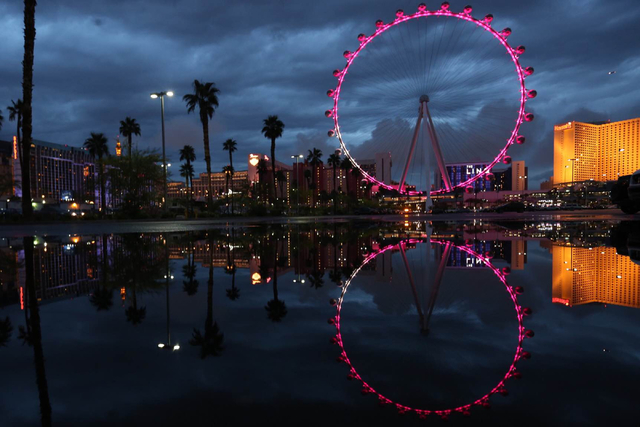 The High Roller is reflected in a puddle at the Linq in Las Vegas on Saturday, April 9, 2016. Brett Le Blanc/Las Vegas Review-Journal Follow @bleblancphoto