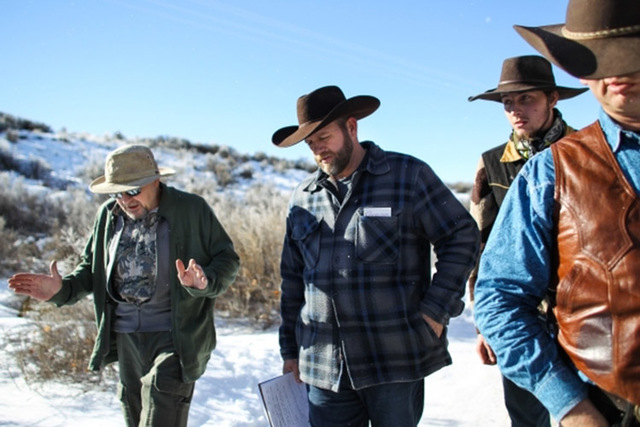 Steve Atkins, left, of Burns, Ore. voices his discontent over the occupation with Ammon Bundy, center and Ryan Bundy, far right, at Malheur National Wildlife Refuge headquarters near Burns, Ore. o ...
