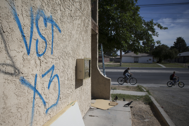 Gang graffiti is seen near N. Lamb Boulevard and Stewart Avenue on Tuesday, April 19, 2016, in Las Vegas. Erik Verduzco/Las Vegas Review-Journal Follow @Erik_Verduzco