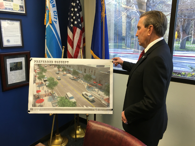 Carson City Mayor Bob Crowell looks at an artist's rendering of a portion of the Carson Downtown Streetscape Improvement Project in his office on Thursday, March 24, 2016. Sean Whaley/Las Vegas Re ...