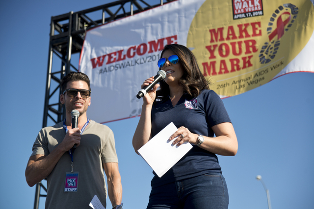 Mercedes Martinez, right, and J.C. Fernandez of KXMB-FM, Mix 94.1 host opening ceremonies during the 26th annual Aid for AIDS of Nevada (AFAN) AIDS Walk Las Vegas at Town Square in Las Vegas on Su ...