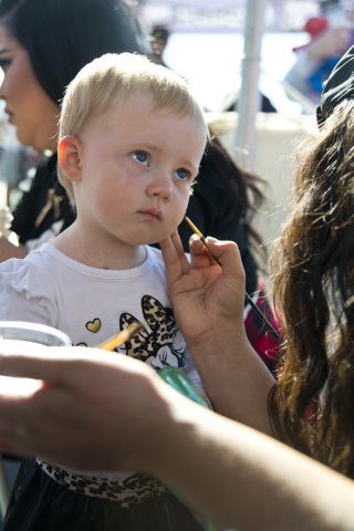 Caroline Hollowood has her face painted during the 26th annual Aid for AIDS of Nevada (AFAN) AIDS Walk Las Vegas at Town Square in Las Vegas on Sunday, April 17, 2016. (Daniel Clark/Las Vegas Revi ...
