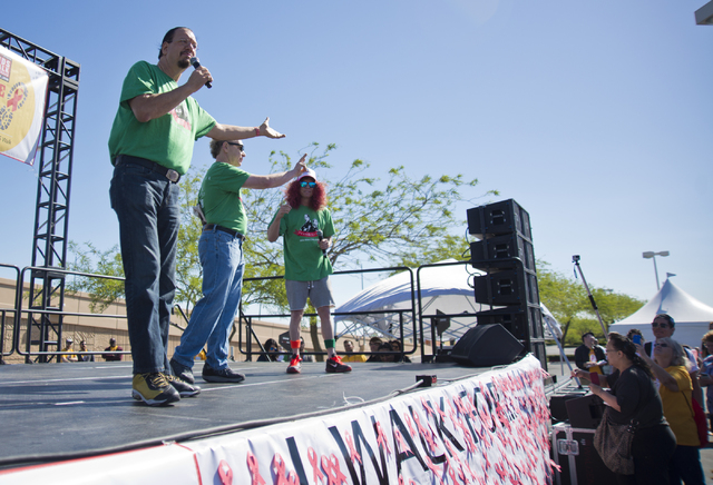 Penn Jillette, from left, Teller, and Carrot Top appear on stage during opening ceremonies for the 26th annual Aid for AIDS of Nevada (AFAN) AIDS Walk Las Vegas at Town Square in Las Vegas on Sund ...