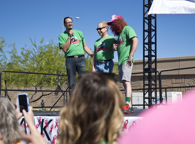 Penn Jillette, from left, Teller, and Carrot Top appear on stage during opening ceremonies for the 26th annual Aid for AIDS of Nevada (AFAN) AIDS Walk Las Vegas at Town Square in Las Vegas on Sund ...