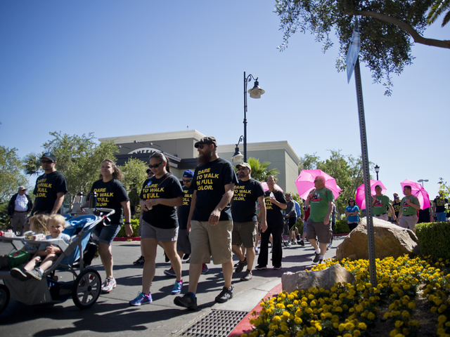 Participants walk during the 26th annual Aid for AIDS of Nevada (AFAN) AIDS Walk Las Vegas at Town Square in Las Vegas on Sunday, April 17, 2016. (Daniel Clark/Las Vegas Review-Journal) Follow @Da ...
