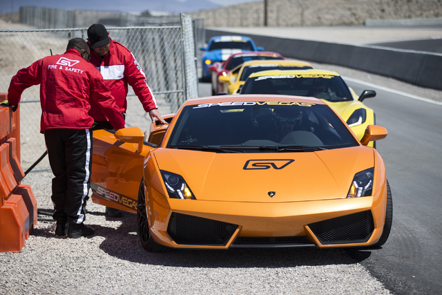 Exotic cars are seen lined up during the ceremonial track opening for SPEEDVEGAS on Friday, April 15, 2016, in Las Vegas. (Erik Verduzco/Las Vegas Review-Journal Follow @Erik_Verduzco)