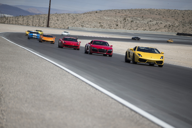 Drivers take a lap in exotic cars during the ceremonial track opening for SPEEDVEGAS on Friday, April 15, 2016, in Las Vegas. (Erik Verduzco/Las Vegas Review-Journal Follow @Erik_Verduzco)