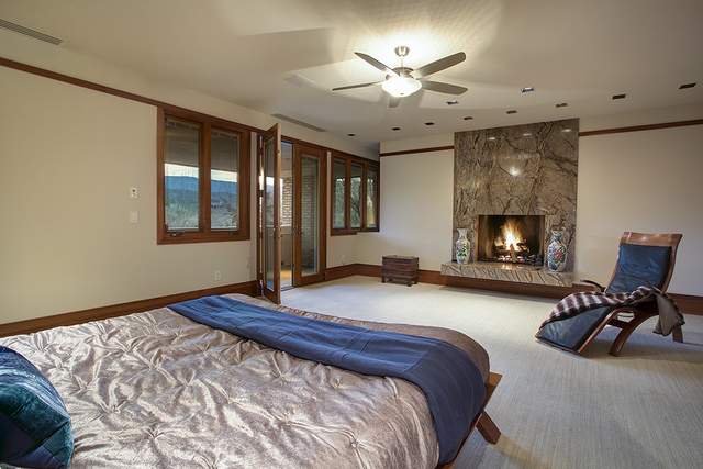 The master suite has a private balcony. (COURTESY OF SYNERGY SOTHEBY'S INTERNATIONAL REALTY)
