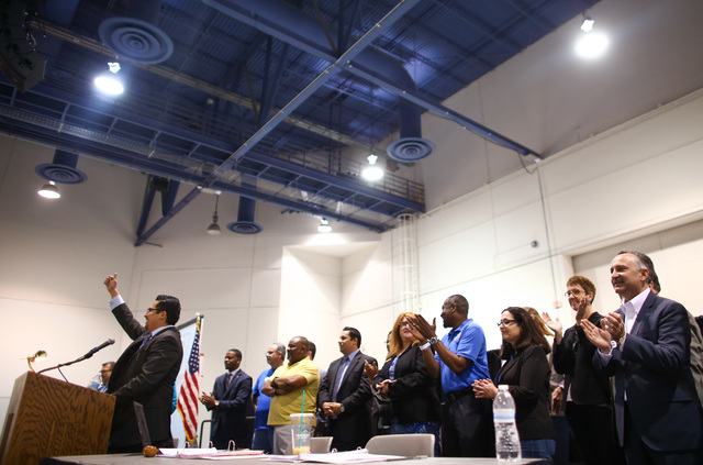 Assemblyman Edgar Flores, left, speaks during the Clark County Democratic Party Convention at Cashman Center in Las Vegas on Saturday, April 2, 2016. (Chase Stevens/Las Vegas Review-Journal) Follo ...