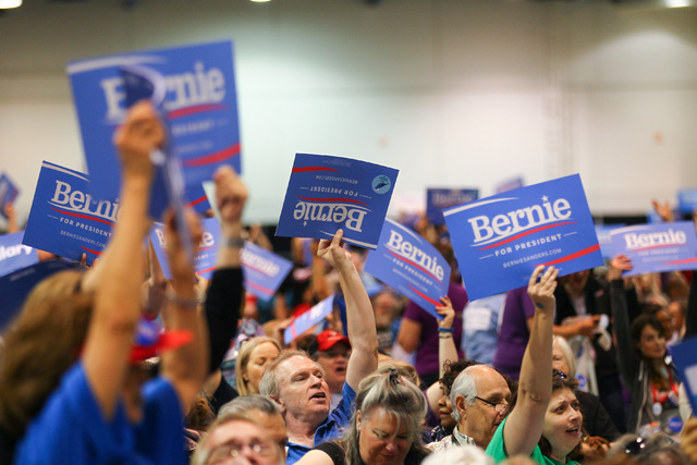Supporters of Democratic presidential candidate Bernie Sanders cheer during the Clark County Democratic Party Convention at Cashman Center in Las Vegas on Saturday, April 2, 2016. (Chase Stevens/L ...
