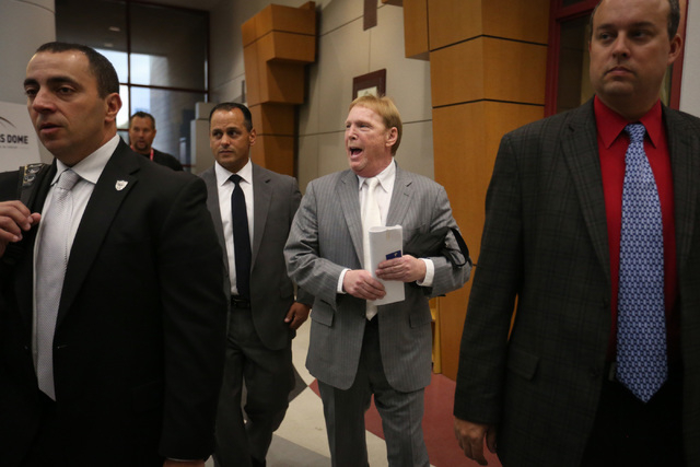 Oakland Raiders owner Mark Davis cheers with Raiders fans during a Southern Nevada Tourism Infrastructure Committee meeting at UNLV in Las Vegas on Thursday, April 28, 2016. (Brett Le Blanc/Las Ve ...