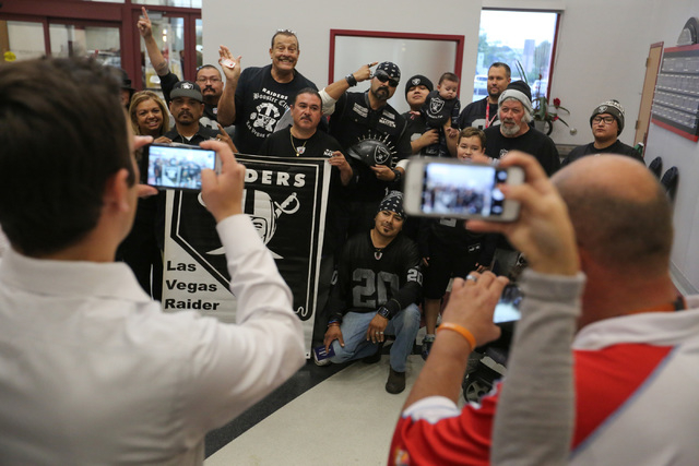 People take photos of Oakland Raiders fans that showed up for a Southern Nevada Tourism Infrastructure Committee meeting at UNLV in Las Vegas on Thursday, April 28, 2016. (Brett Le Blanc/Las Vegas ...