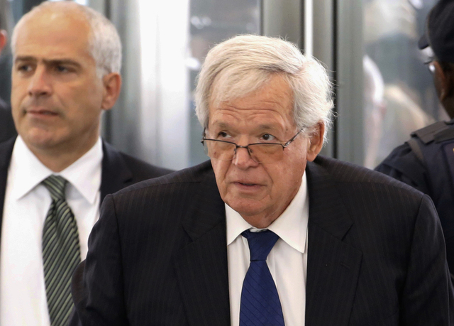 Former U.S. House Speaker Dennis Hastert arrives at the federal courthouse in Chicago for his arraignment on federal charges in his hush-money case in Chicago in 2015. (Charles Rex Arbogast/The As ...