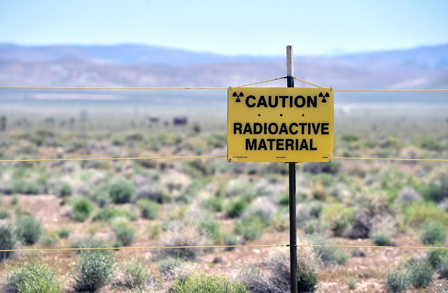 A warning sign is displayed at the Counter-Terrorism Operations Support training facility near the blast site from the 1955 Apple-2 nuclear bomb test at the Nevada National Security Site on Wednes ...