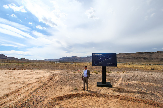 Faraday Future Vice President of Manufacturing Dag Reckhorn waits for others during the groundbreaking for the company's planned 900-acre manufacturing site in North Las Vegas on Wednesday, April ...