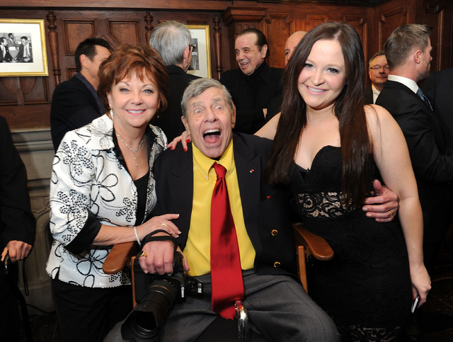 Entertainer Jerry Lewis, center, his wife, SanDee Pitnick, left, and his daughter Danielle Lewis pose for a portrait at the Friars Club before his 90th birthday celebration on Friday, April 8, 201 ...