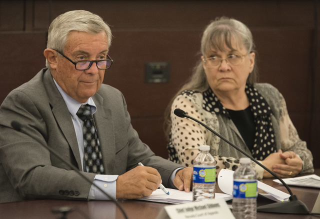 Nevada State Supreme court justice James Hardesty and Eighth Judicial District court judge Cynthia Dianne Steel work on the Nevada Supreme court panel at the Regional Justice Center in Las Vegas t ...