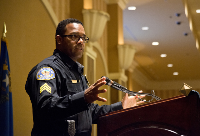 Henderson Police Sgt. Kirk Moore speaks about a bill aimed at decreasing the number of squatters living in vacant homes during the Greater Las Vegas Association of Realtors general membership meet ...