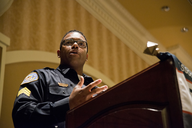 Henderson Police Sgt. Kirk Moore speaks about a bill aimed at decreasing the number of squatters living in vacant homes during the Greater Las Vegas Association of Realtors general membership meet ...