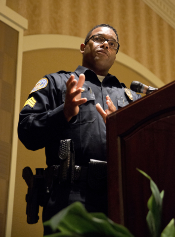 Henderson Police Sgt. Kirk Moore speaks about a bill aimed at decreasing the number of squatters living in vacant homes during the Greater Las Vegas Association of Realtors general membership meet ...