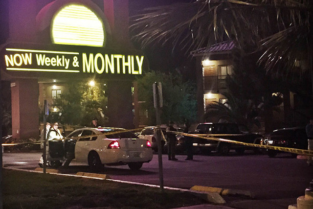 Police investigate a fatal shooting at 4855 Boulder Highway, near Flamingo Road.(Rachel Crosby/Las Vegas Review-Journal)