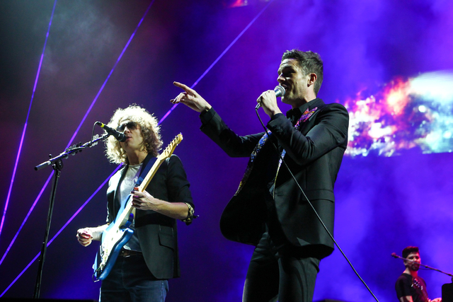 Brandon Flowers, right, and Dave Keuning of The Killers perform during the grand opening of the T-Mobile Arena in Las Vegas on Wednesday, April 6, 2016. Chase Stevens/Las Vegas Review-Journal Foll ...