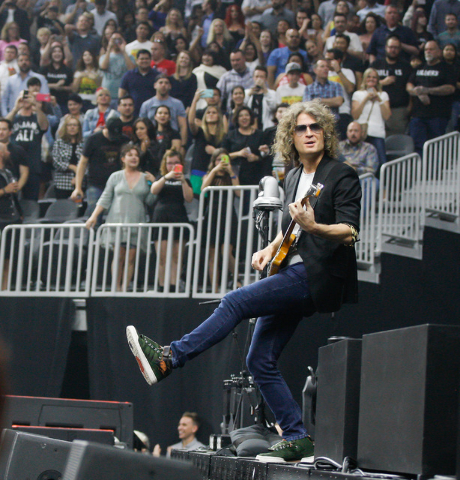 Dave Keuning of The Killers performs during the grand opening of the T-Mobile Arena in Las Vegas on Wednesday, April 6, 2016. Chase Stevens/Las Vegas Review-Journal Follow @csstevensphoto