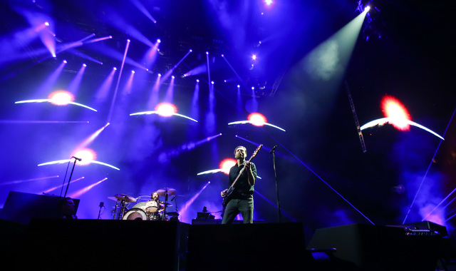 Ronnie Vannucci, left, and Mark Stoermer of The Killers performs during the grand opening of the T-Mobile Arena in Las Vegas on Wednesday, April 6, 2016. Chase Stevens/Las Vegas Review-Journal Fol ...