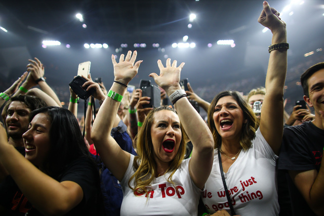 Nicole Kiefe, center, and Silvia Porter, right, cheer before the The Killers perform during the grand opening of the T-Mobile Arena in Las Vegas on Wednesday, April 6, 2016. Chase Stevens/Las Vega ...