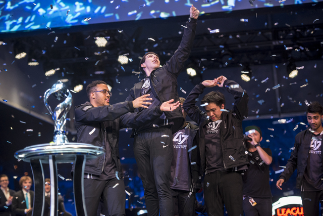 Counter Logic Gaming celebrates after defeating TSM during the North America League of Legends Championship Series Spring Final at the Mandalay Bay Event Center in Las Vegas on Sunday, April 17, 2 ...