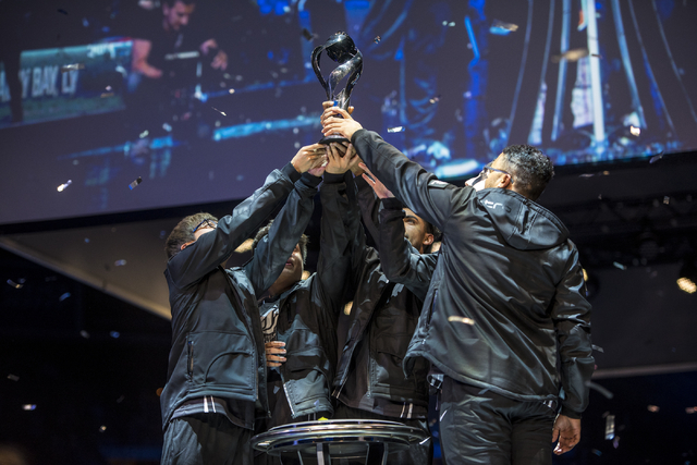 Counter Logic Gaming celebrates after defeating TSM during the North America League of Legends Championship Series Spring Final at the Mandalay Bay Event Center in Las Vegas on Sunday, April 17, 2 ...