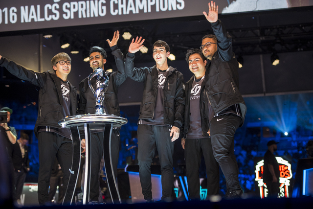 Counter Logic Gaming celebrates after defeating TSM during the North America League of Legends Championship Series Spring Final at the Mandalay Bay Event Center in Las Vegas on Sunday, April 17, 2 ...