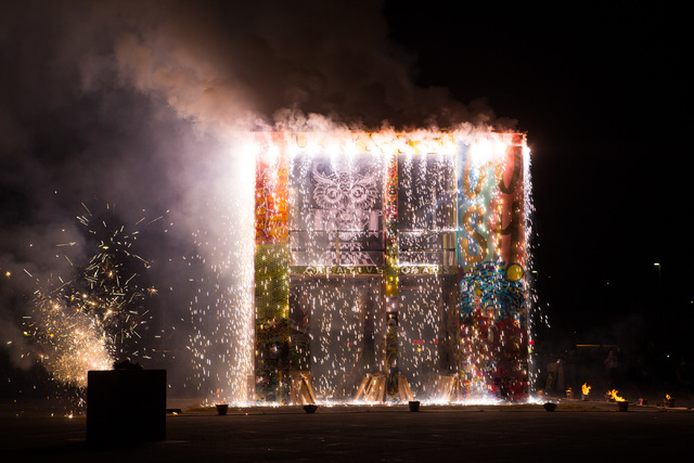 The fire ceremony goes on for the Life Cube in downtown Las Vegas on Saturday, April 2, 2016. (Chase Stevens/Las Vegas Review-Journal) Follow @csstevensphoto