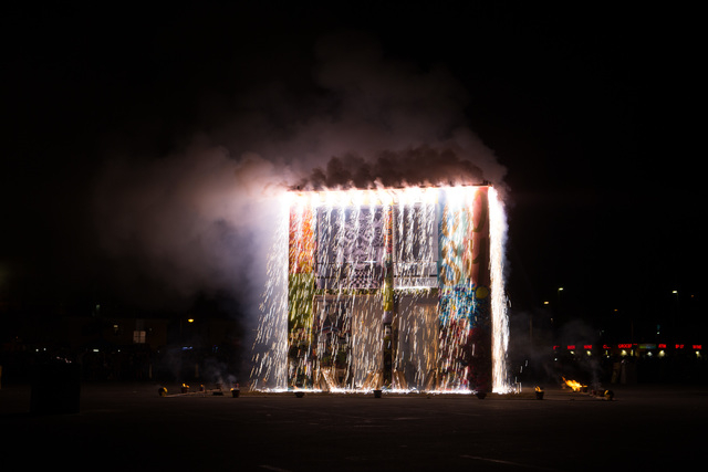 The fire ceremony goes on for the Life Cube in downtown Las Vegas on Saturday, April 2, 2016. (Chase Stevens/Las Vegas Review-Journal) Follow @csstevensphoto