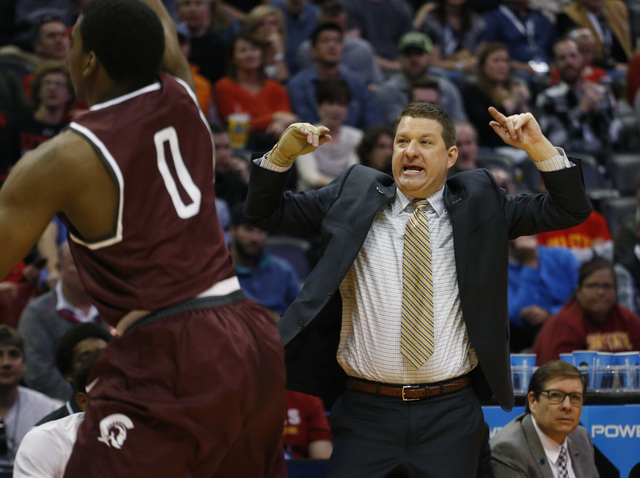 Arkansas Little Rock head coach Chris Beard directs his team against Iowa State during the first half of a second-round men's college basketball game Saturday, March 19, 2016, in the NCAA Tourname ...