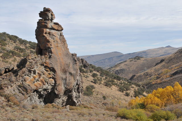 In this photo taken October 2015 near Hinkey Summit, 50 miles north of Winnemucca, rocks jut from the landscape where a gunfight took place April 29, 1868 between a cavalry search party and Paiute ...