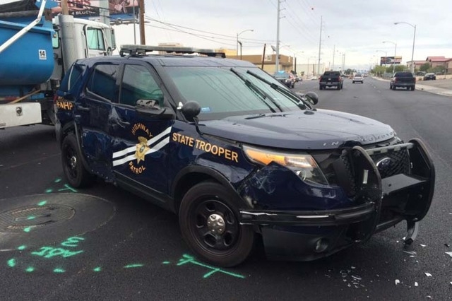 A Nevada Highway Patrol trooper was involved in a four-vehicle crash on Russell Road near Wynn Road on Friday, April 8, 2016. (Courtesy/Twitter/NHP Southern Command)
