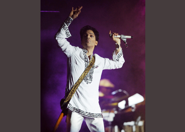 FILE - In this April 26, 2008  file photo, Prince performs during the second day of the Coachella Valley Music and Arts Festival in Indio, Calif. Prince's publicist has confirmed that Prince died  ...
