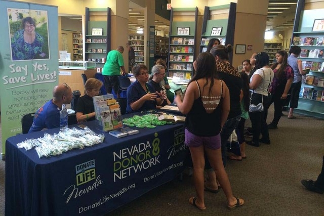Nevada Donor Network volunteers speak with Henderson residents at a health fair on Aug. 2 at the Green Valley Library. (Special to View)